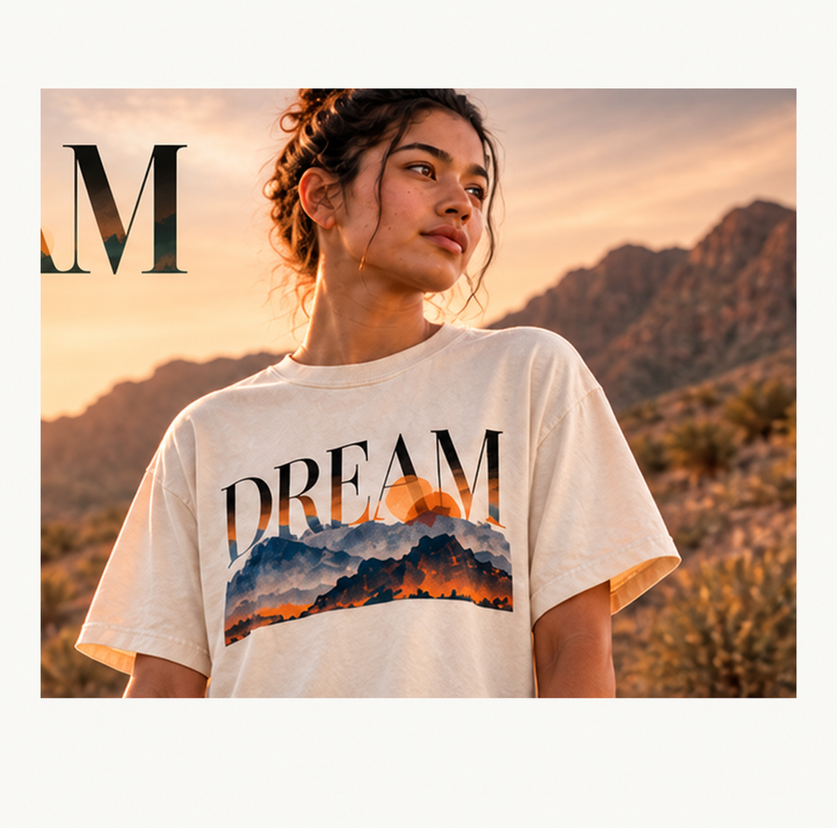 Model wearing the DREAM Tee in a desert setting
